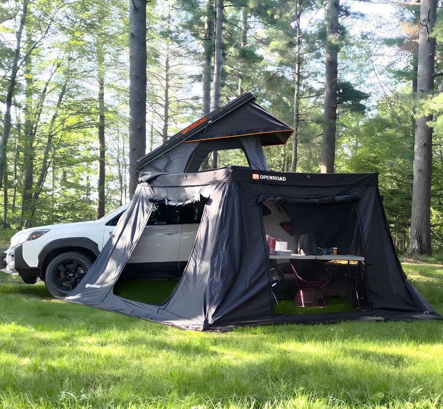 OPENROAD 270 awning with side walls creating enclosed camping shelter on SUV in forest